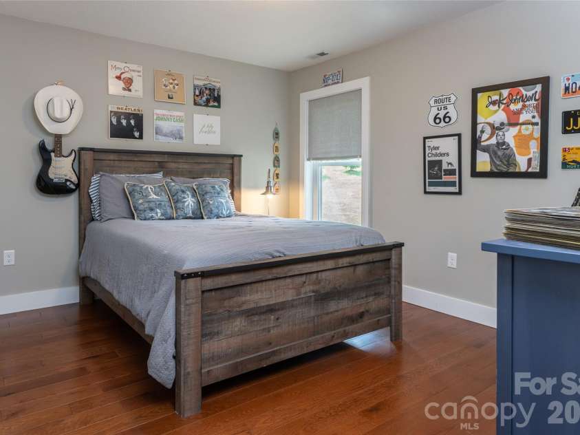 11 Ibbie Roberts Road, Alexander, NC 28701.  MLS# CAR4396356, YatesRealty ID 43060. Lower Level Guest Bedroom #2