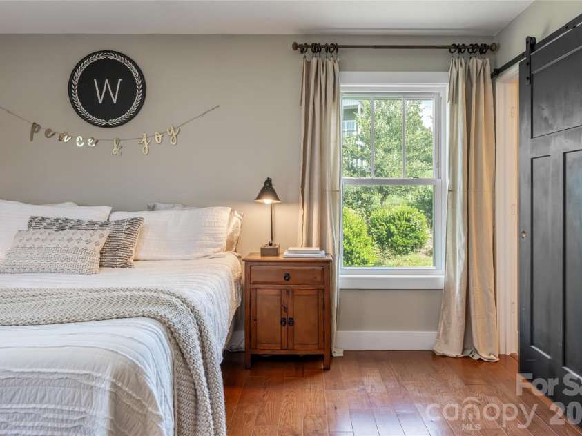11 Ibbie Roberts Road, Alexander, NC 28701.  MLS# CAR4396356, YatesRealty ID 43060. Primary Bedroom