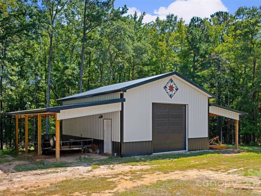 1715 Hopewell Road, Rock Hill, SC 29730.  MLS# CAR4310863, YatesRealty ID 4307. Large barn with plenty of room for projects and equipment.