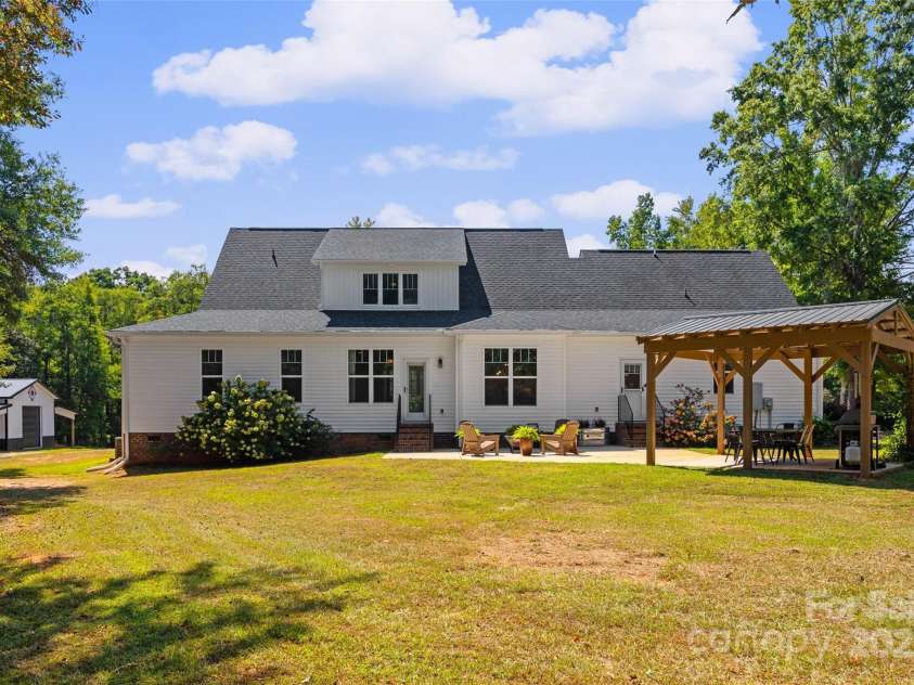 1715 Hopewell Road, Rock Hill, SC 29730.  MLS# CAR4310863, YatesRealty ID 4307. Large patio and covered outdoor dining.