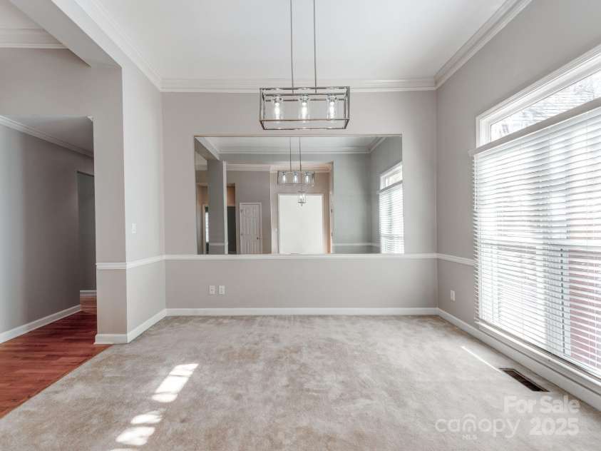 5839 Painted Fern Court, Charlotte, NC 28269.  MLS# CAR4204621, YatesRealty ID 4307. Main Floor Dining Room