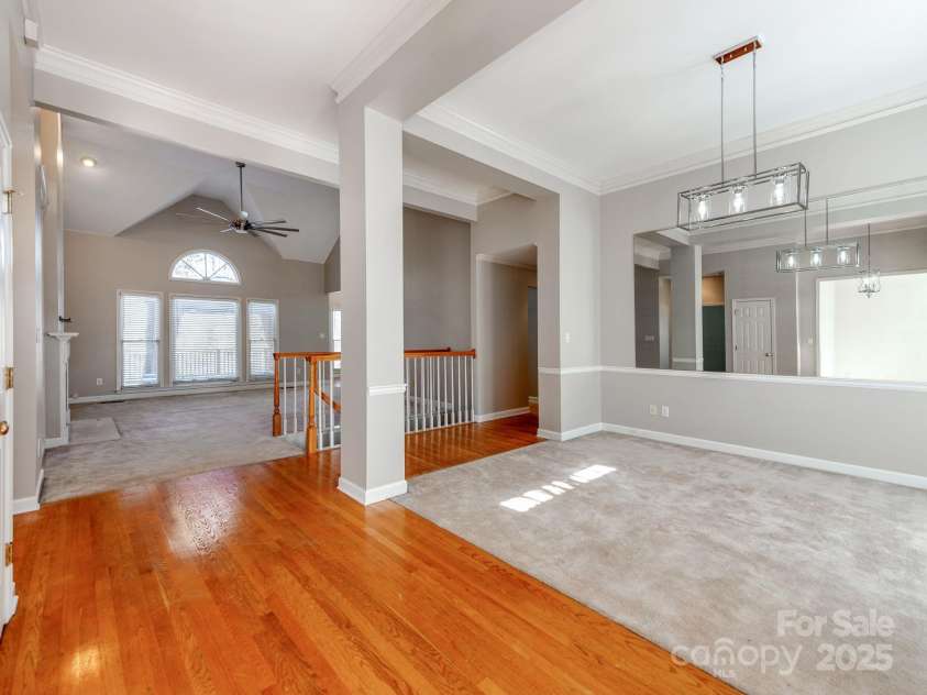 5839 Painted Fern Court, Charlotte, NC 28269.  MLS# CAR4204621, YatesRealty ID 4307. Main Foor Dining Room to Family Room