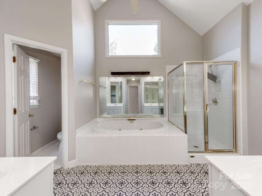 5839 Painted Fern Court, Charlotte, NC 28269.  MLS# CAR4204621, YatesRealty ID 4307. Owner's Suite Bath - Jetted Tub