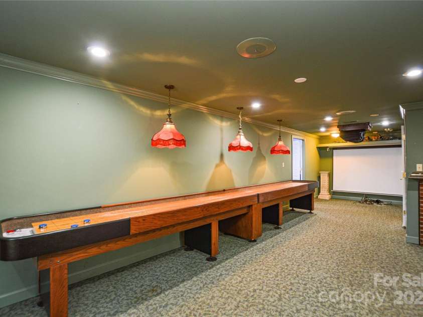 5839 Painted Fern Court, Charlotte, NC 28269.  MLS# CAR4204621, YatesRealty ID 4307. Projector and Screen Included