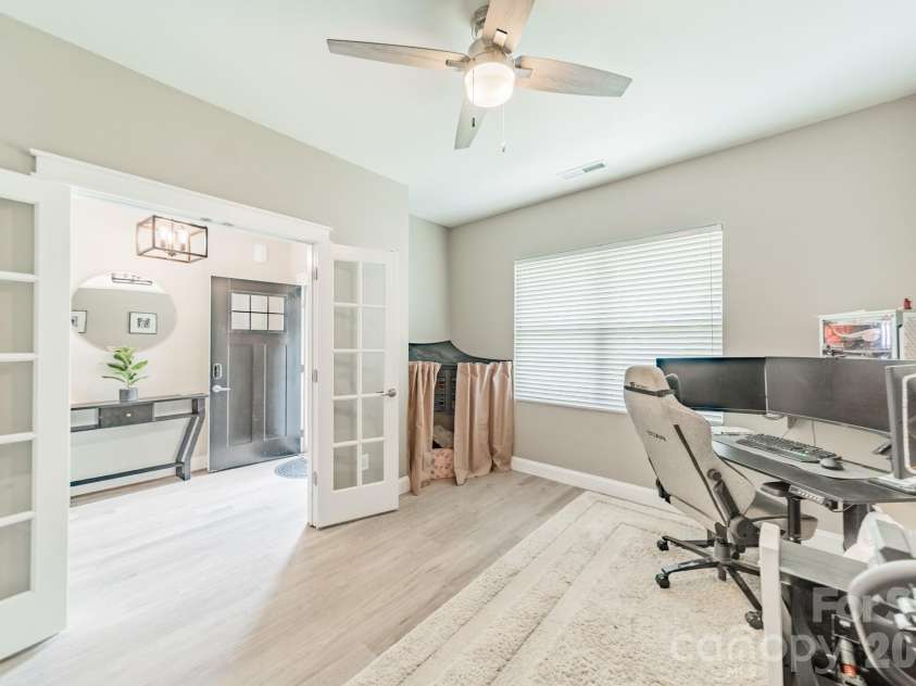 10003 Blue Stream Lane, Indian Trail, NC 28079.  MLS# CAR4408302, YatesRealty ID 43078. Formal Entryway & home office