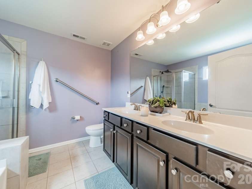 10003 Blue Stream Lane, Indian Trail, NC 28079.  MLS# CAR4408302, YatesRealty ID 43078. Primary Bathroom