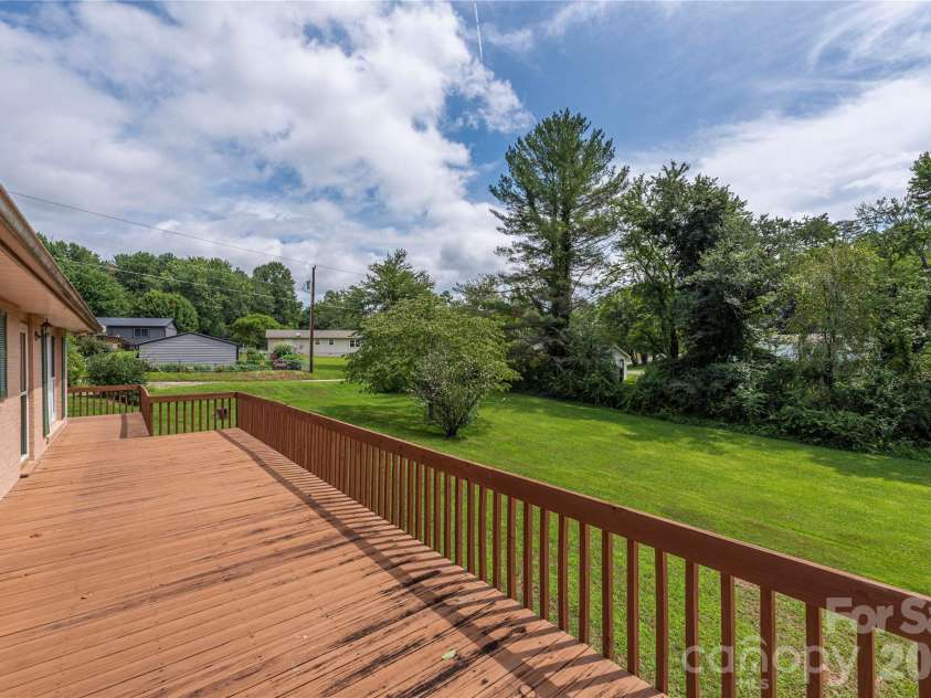 69 Emerald Lane, Hendersonville, NC 28792.  MLS# CAR4405038, YatesRealty ID 43085. See all the deck space!!