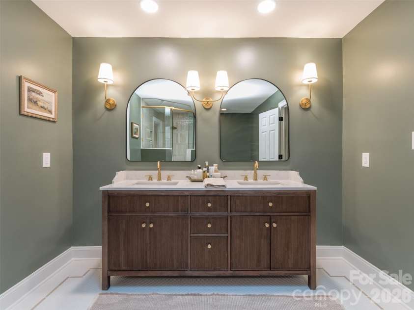 6129 Page Court, Charlotte, NC 28270.  MLS# CAR4408217, YatesRealty ID 43087. Exceptionally Expanded & Designed New Primary Bath with Custom Vanity, Sconce & Recessed Lighting, Custom Tile Flooring with In-Lays, Claw Foot Soaking Tub, & Walk-In Shower.