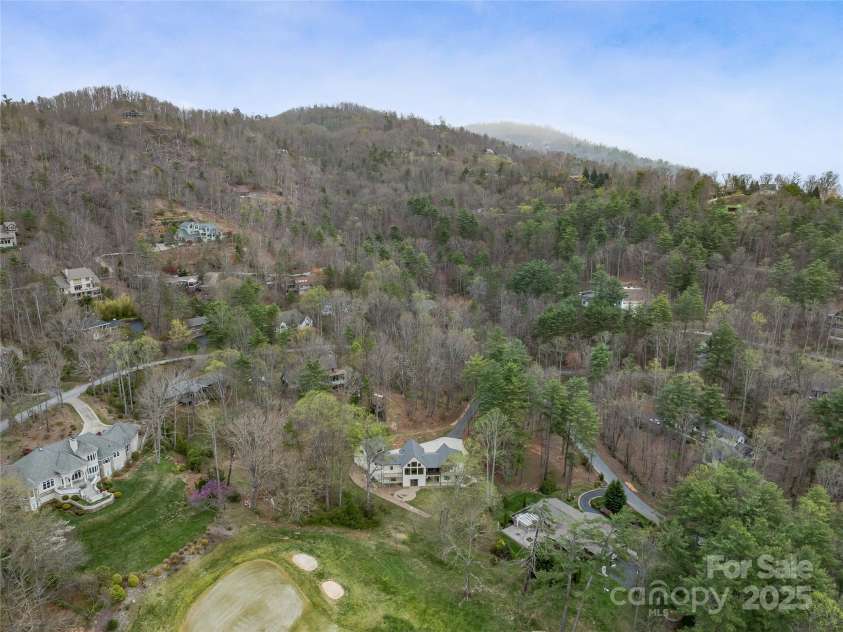 165 Robinhood Road, Asheville, NC 28804.  MLS# CAR4240751, YatesRealty ID 4309. A rare blend of privacy and panorama, just minutes from downtown Asheville