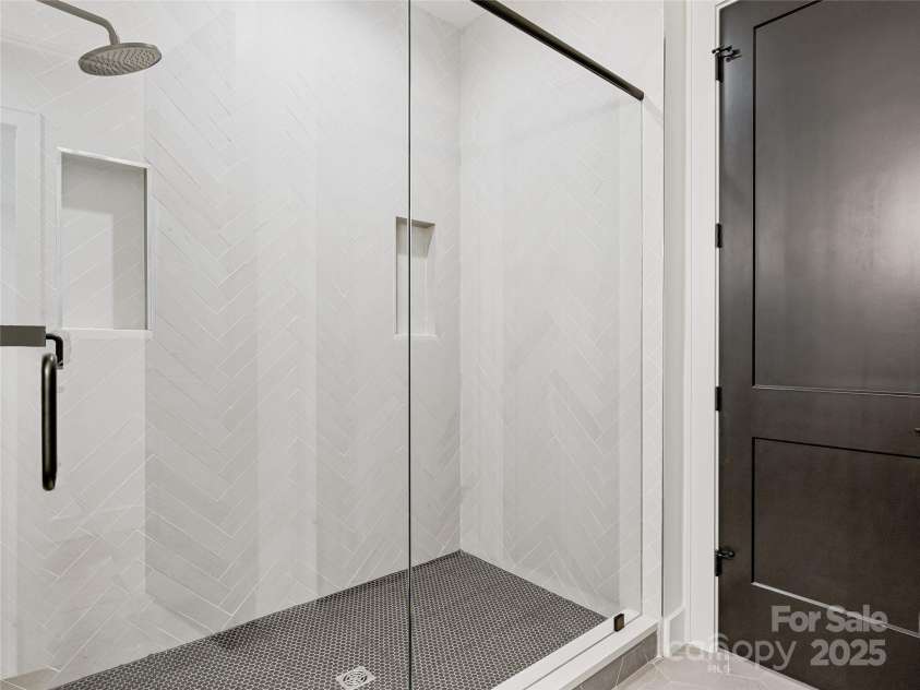 165 Robinhood Road, Asheville, NC 28804.  MLS# CAR4240751, YatesRealty ID 4309. Hall bathroom tile walk in shower