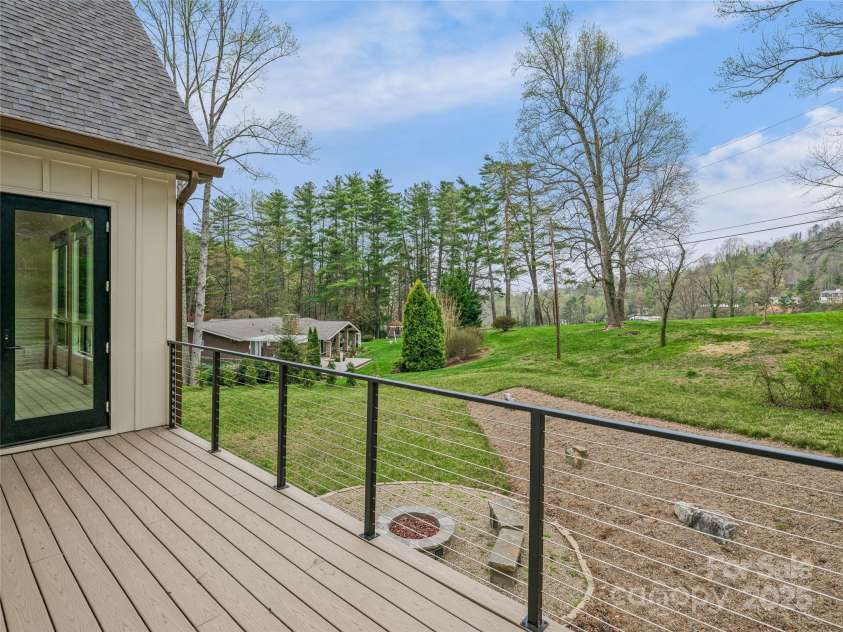 165 Robinhood Road, Asheville, NC 28804.  MLS# CAR4240751, YatesRealty ID 4309. Sun-soaked and spacious—the perfect perch for morning coffee, afternoon lounging, or golden-hour gatherings