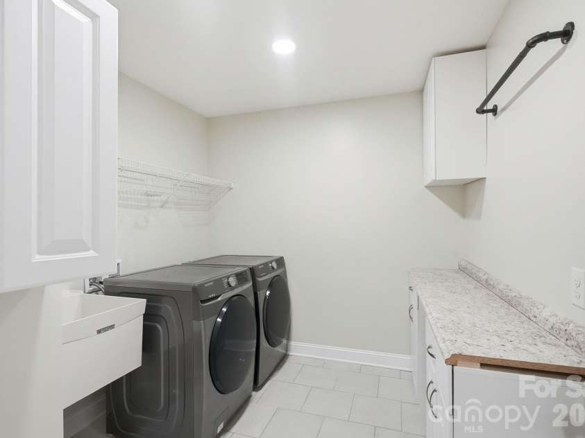 3675 Bay Drive, Sherrills Ford, NC 28673.  MLS# CAR4405778, YatesRealty ID 43092. Spacious laundry room on second level