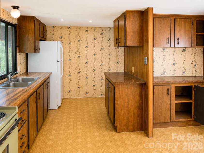 30 Gertrude Lane, Candler, NC 28715.  MLS# CAR4407471, YatesRealty ID 43105. 