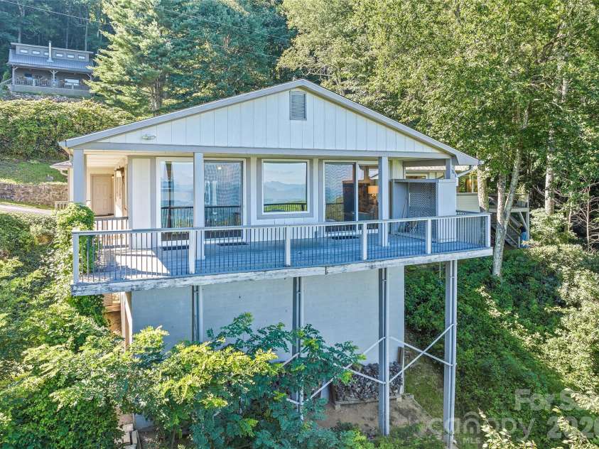 75 Briarwood Lane, Maggie Valley, NC 28751.  MLS# CAR4411453, YatesRealty ID 43128. Covered Back Deck