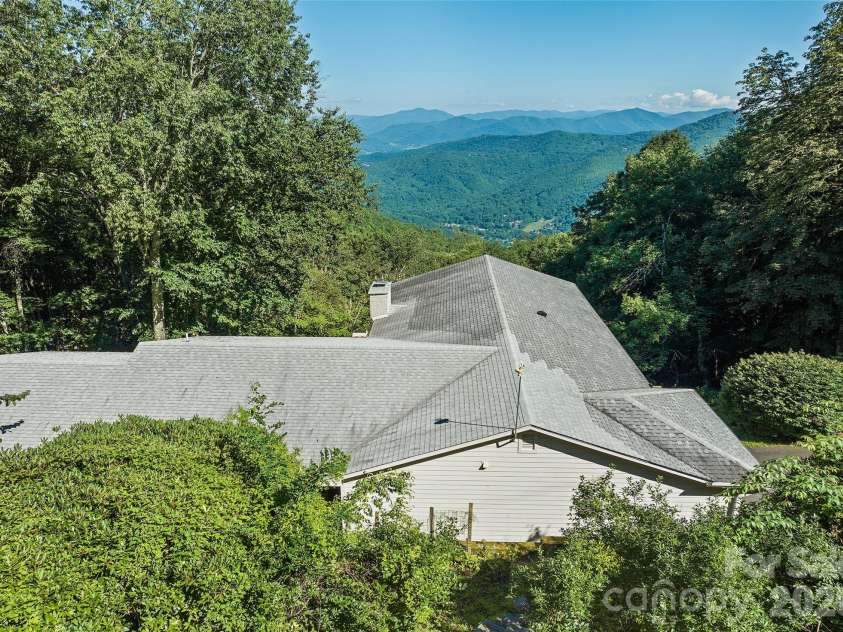 75 Briarwood Lane, Maggie Valley, NC 28751.  MLS# CAR4411453, YatesRealty ID 43128. Distant View from the Road