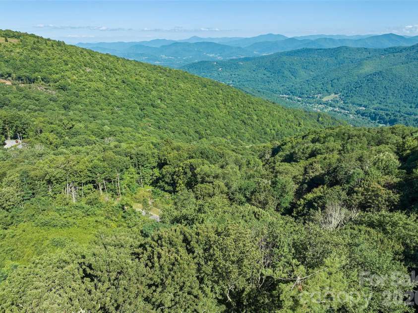 75 Briarwood Lane, Maggie Valley, NC 28751.  MLS# CAR4411453, YatesRealty ID 43128. Drone View Above Road