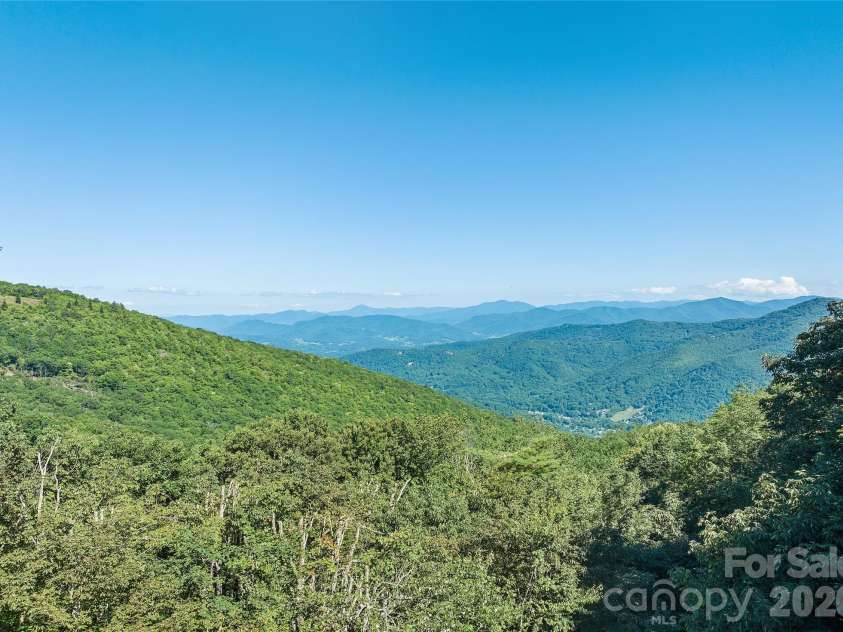 75 Briarwood Lane, Maggie Valley, NC 28751.  MLS# CAR4411453, YatesRealty ID 43128. Drone View From the Road
