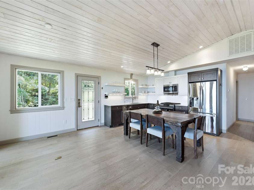 75 Briarwood Lane, Maggie Valley, NC 28751.  MLS# CAR4411453, YatesRealty ID 43128. Entry Door Conveniently Located On Side Deck/Walkway