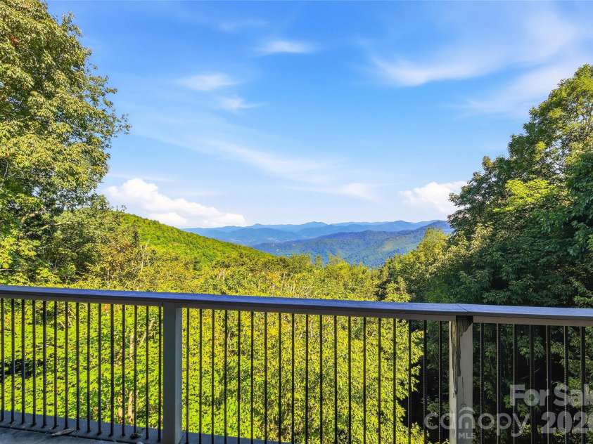 75 Briarwood Lane, Maggie Valley, NC 28751.  MLS# CAR4411453, YatesRealty ID 43128. Gorgeous Multi-layered View from Back Deck!