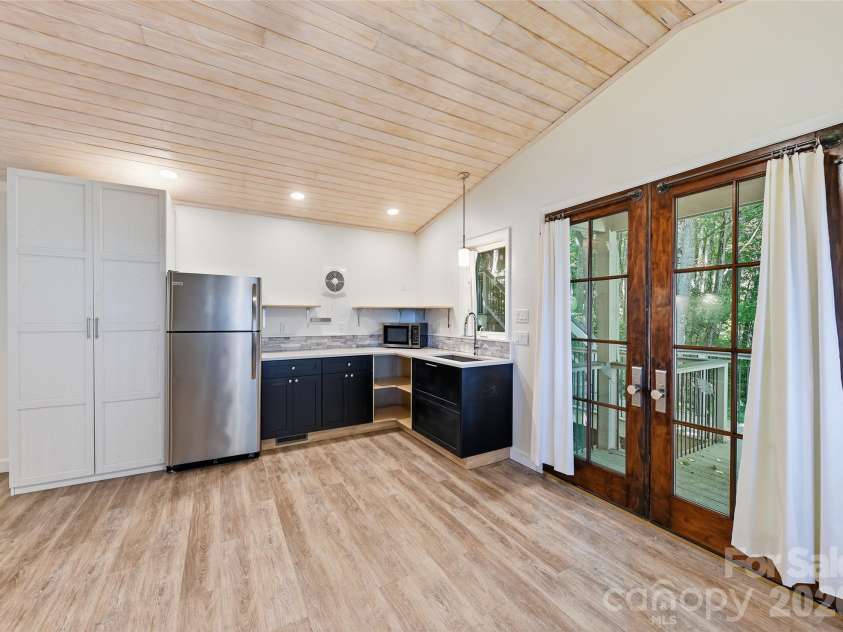 75 Briarwood Lane, Maggie Valley, NC 28751.  MLS# CAR4411453, YatesRealty ID 43128. Guest Suite Kitchen Area