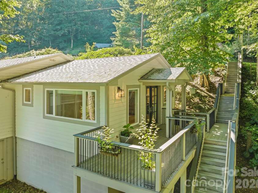 75 Briarwood Lane, Maggie Valley, NC 28751.  MLS# CAR4411453, YatesRealty ID 43128. Guest Suite Private Deck and Entry