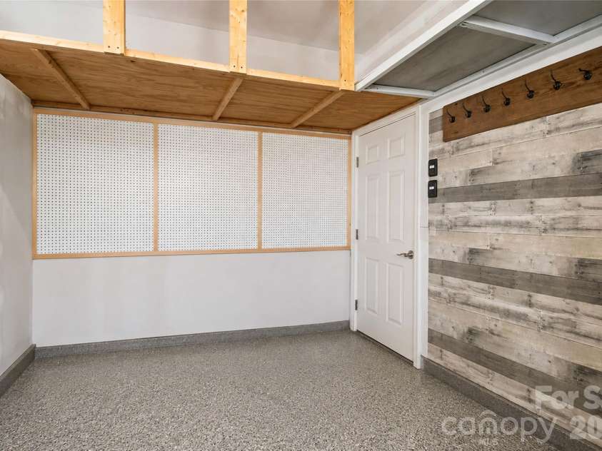4108 Bent Green Lane, Monroe, NC 28112.  MLS# CAR4411876, YatesRealty ID 43129. 3 Car Garage with Epoxy flooring and storage area