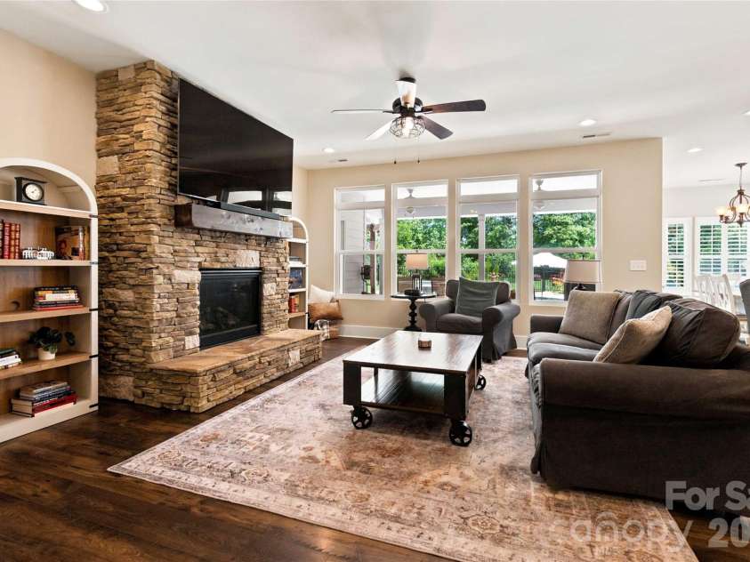 4108 Bent Green Lane, Monroe, NC 28112.  MLS# CAR4411876, YatesRealty ID 43129. Gorgeous stone fireplace with raised hearth and mantel.