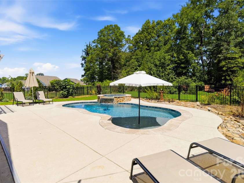 4108 Bent Green Lane, Monroe, NC 28112.  MLS# CAR4411876, YatesRealty ID 43129. Why go on vacation with a pool like this!