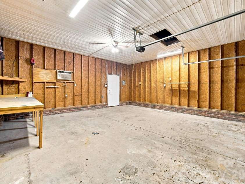 910 Little Brook Circle, York, SC 29745.  MLS# CAR4409495, YatesRealty ID 43130. Garage workshop