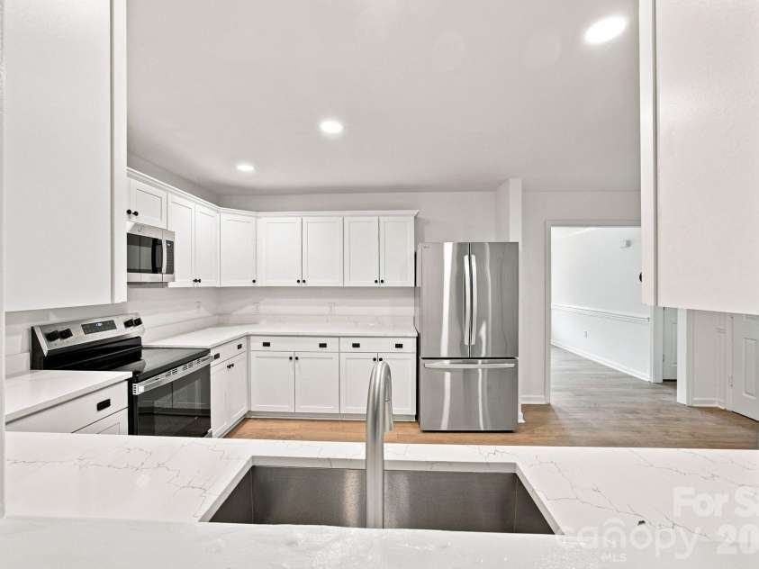 910 Little Brook Circle, York, SC 29745.  MLS# CAR4409495, YatesRealty ID 43130. Kitchen from living room