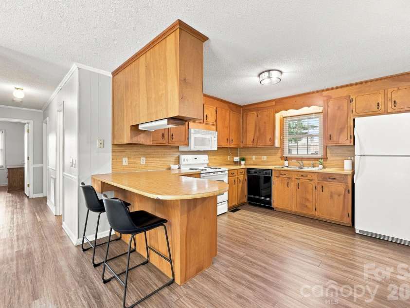 558 Snuggs Street, Albemarle, NC 28001.  MLS# CAR4410926, YatesRealty ID 43135. 