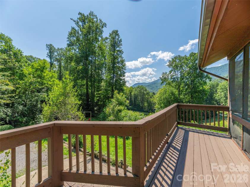 3543 Dark Ridge Road, Sylva, NC 28779.  MLS# CAR4410870, YatesRealty ID 43138. Deck Mountain View