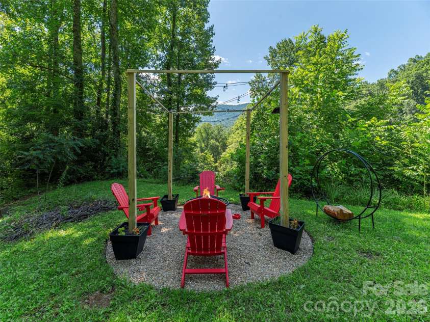 3543 Dark Ridge Road, Sylva, NC 28779.  MLS# CAR4410870, YatesRealty ID 43138. Firepit to Mountain View