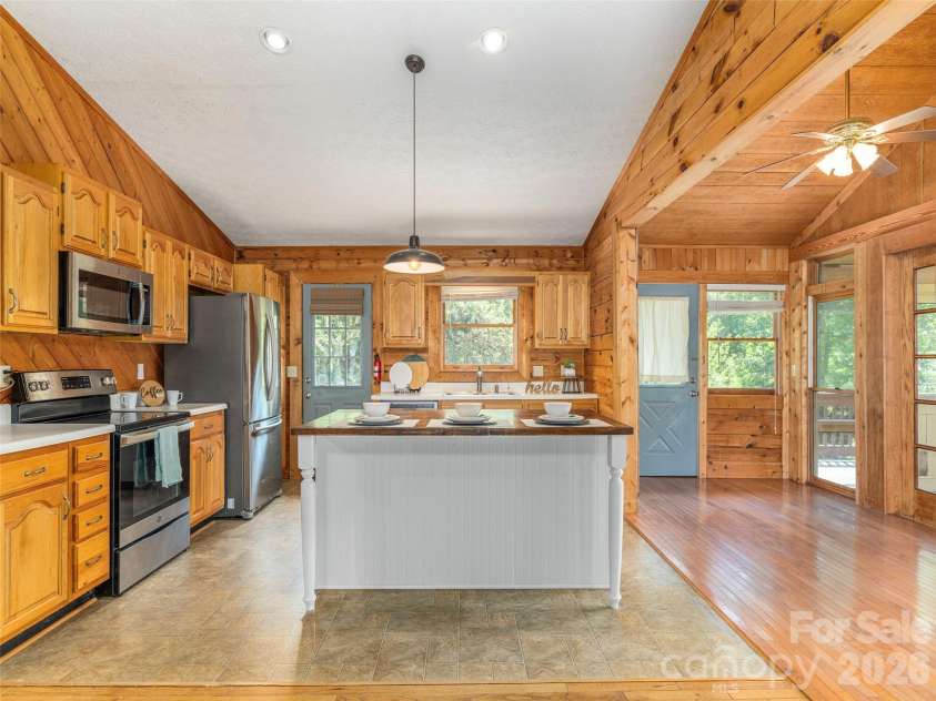 3543 Dark Ridge Road, Sylva, NC 28779.  MLS# CAR4410870, YatesRealty ID 43138. Kitchen and Dining View