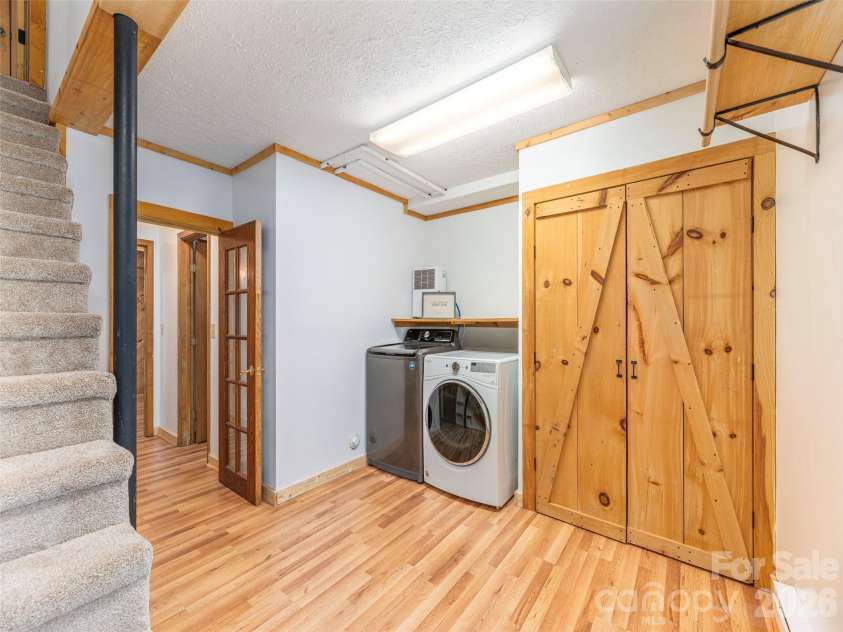 3543 Dark Ridge Road, Sylva, NC 28779.  MLS# CAR4410870, YatesRealty ID 43138. Laundry Room Lower Level