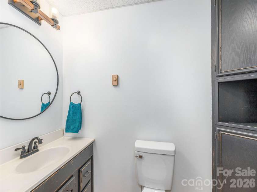 3543 Dark Ridge Road, Sylva, NC 28779.  MLS# CAR4410870, YatesRealty ID 43138. Lower Level Bathroom (2)