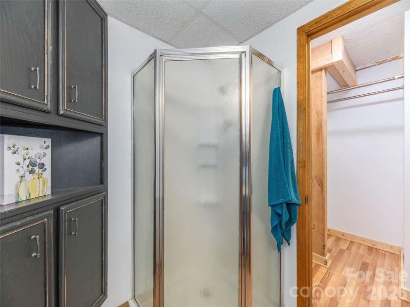 3543 Dark Ridge Road, Sylva, NC 28779.  MLS# CAR4410870, YatesRealty ID 43138. Lower Level Shower View