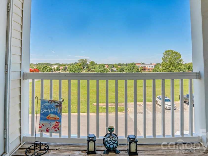 3811 Carl Parmer Drive, Harrisburg, NC 28075.  MLS# CAR4408514, YatesRealty ID 43145. Private Covered Balcony