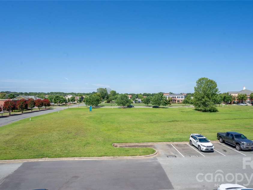 3811 Carl Parmer Drive, Harrisburg, NC 28075.  MLS# CAR4408514, YatesRealty ID 43145. Unobstructed Balcony Views!