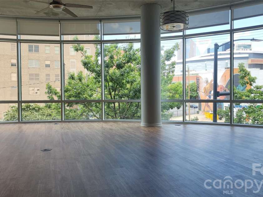505 6th Street, Charlotte, NC 28202.  MLS# CAR4352098, YatesRealty ID 4316. Large OPEN Dining Room Area featuring Floor to Ceiling Windows throughtout