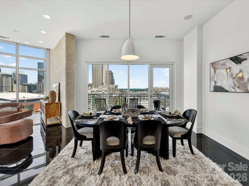 505 6th Street, Charlotte, NC 28202.  MLS# CAR4392815, YatesRealty ID 4316. Dining, with glass doors to balcony