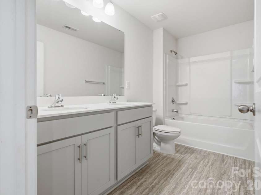3168 Green Apple Drive, Dallas, NC 28034.  MLS# CAR4413344, YatesRealty ID 43172. Bathroom 3