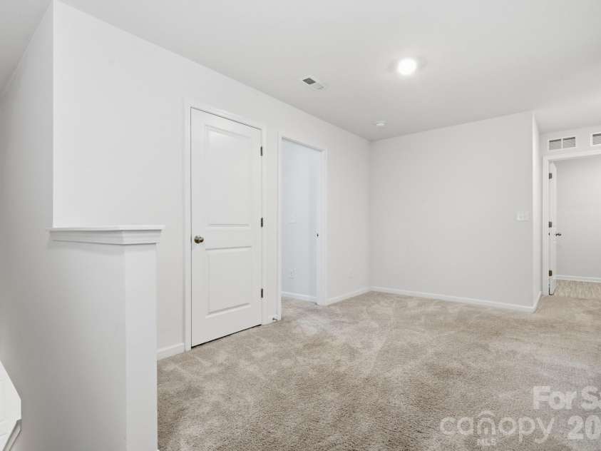 3168 Green Apple Drive, Dallas, NC 28034.  MLS# CAR4413344, YatesRealty ID 43172. Loft side view