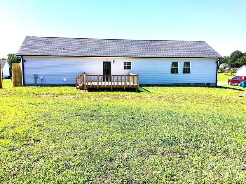 109 Wheat Field Drive, Shelby, NC 28152.  MLS# CAR4413358, YatesRealty ID 43175. Rear of Home and Deck view