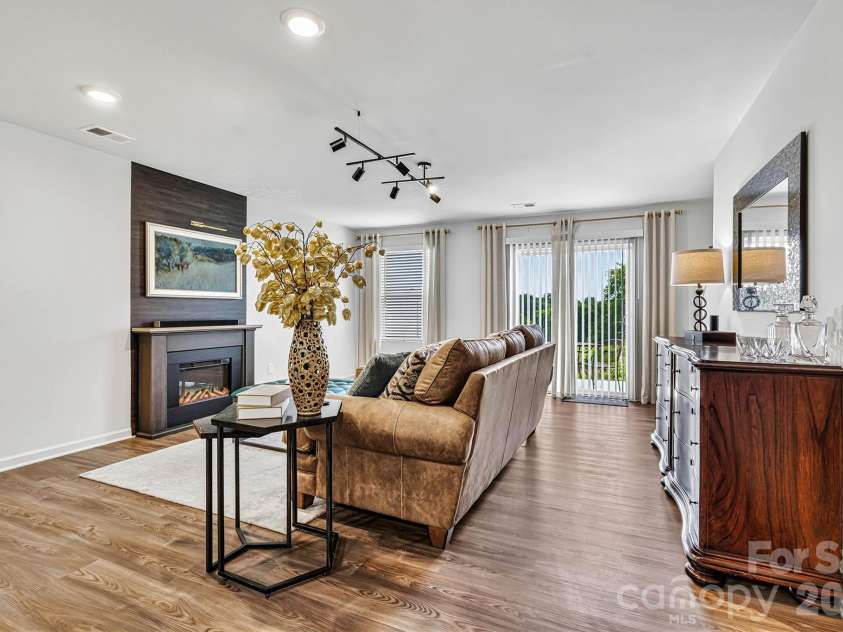 1942 Tranquility Circle, Newton, NC 28658.  MLS# CAR4413135, YatesRealty ID 43176. Living Room/Back Patio Entry View