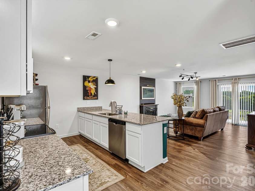 1942 Tranquility Circle, Newton, NC 28658.  MLS# CAR4413135, YatesRealty ID 43176. Open Concept Kitchen/Dining/Living View