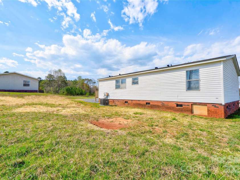 104 Buck Haven Court, Lawndale, NC 28090.  MLS# CAR4239612, YatesRealty ID 4318. Back Right