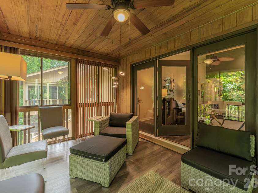 204 Live Oak Lane, Hendersonville, NC 28791.  MLS# CAR4410772, YatesRealty ID 43183. Screened, Enclosed Covered Deck