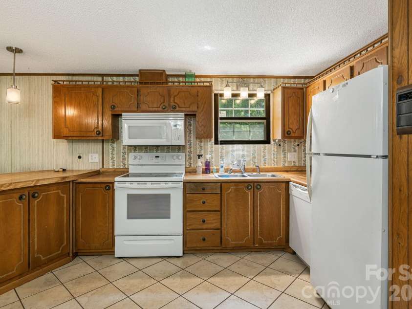 1903 Old Mountain Road, Mars Hill, NC 28753.  MLS# CAR4413410, YatesRealty ID 43194. 