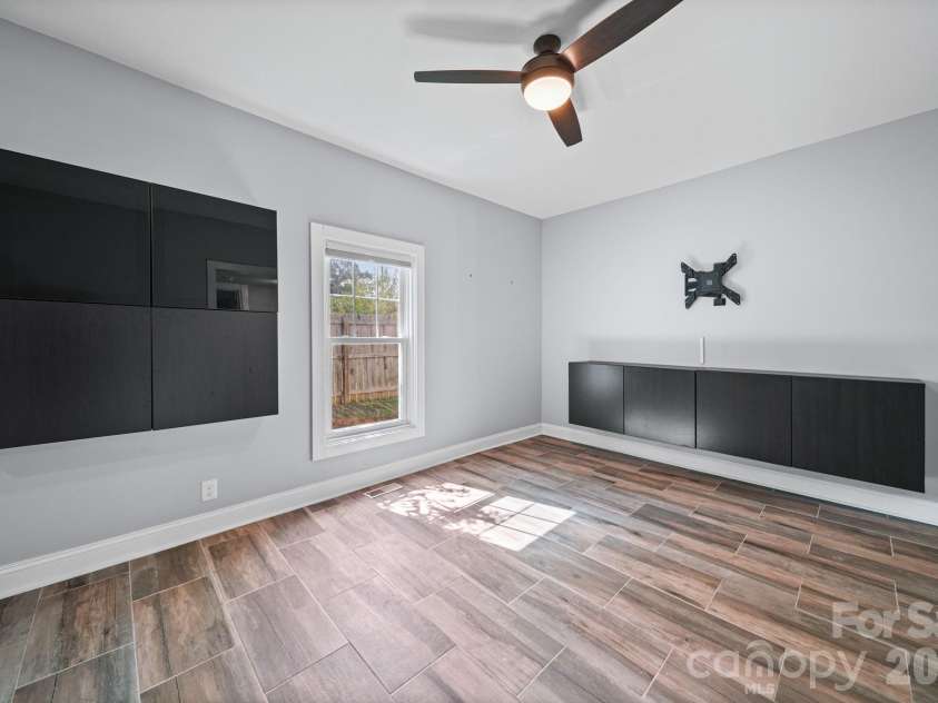 703 Windsor Street, Monroe, NC 28112.  MLS# CAR4412570, YatesRealty ID 43195. Living room
